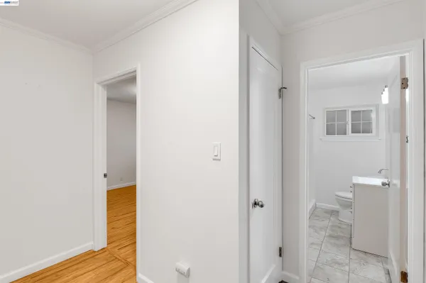 a spacious bathroom with a toilet