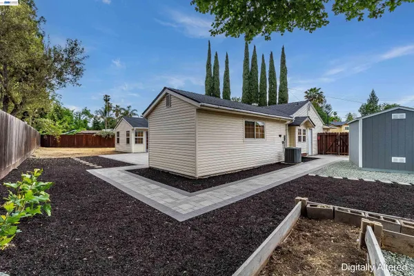 a backyard of a house with lots of green space