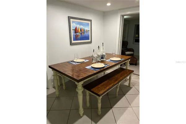 a spacious bathroom with a double vanity sink and a mirror