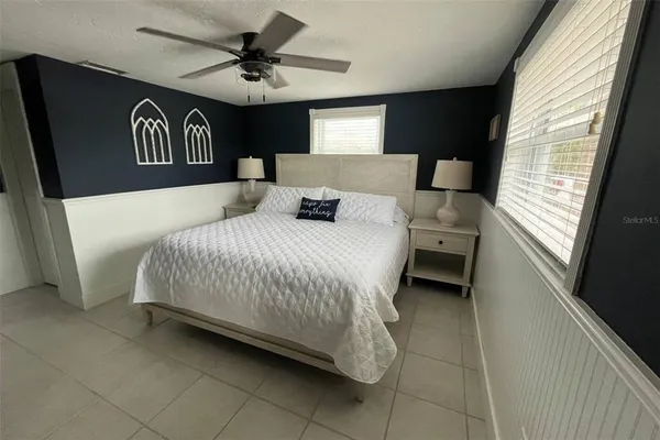 a view of a swimming pool with a lounge chairs