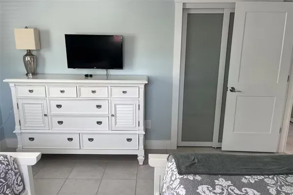 a picture of a bathroom with a shower