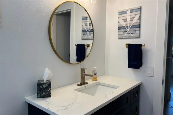 a view of a chairs and tables in the patio