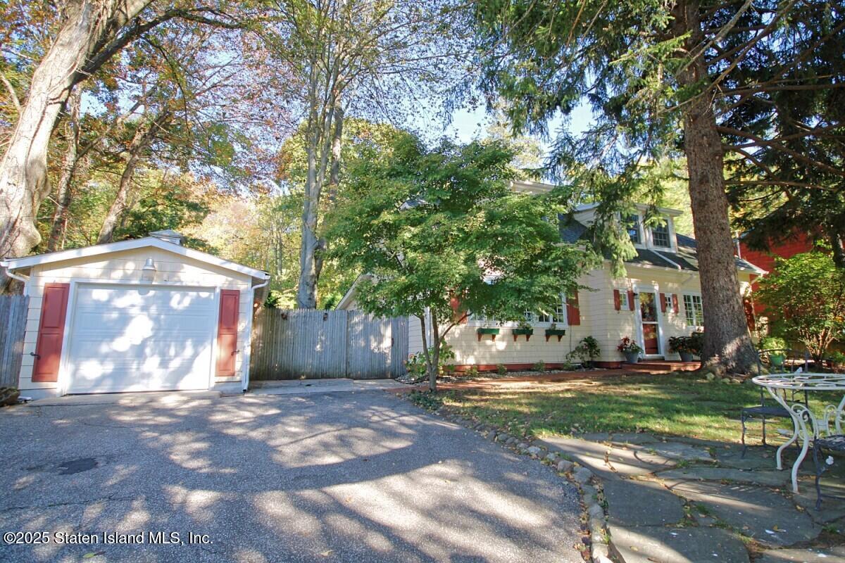 443 Edinboro Road Staten Island, NY 10306 - Photo 2 of 33 a view of a house with a yard