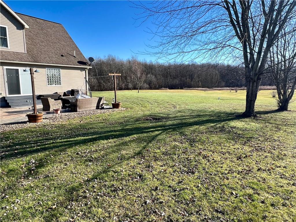 100 Perrine Road Grove City, PA 16127 - Photo 21 of 24 a view of a house with backyard and sitting area