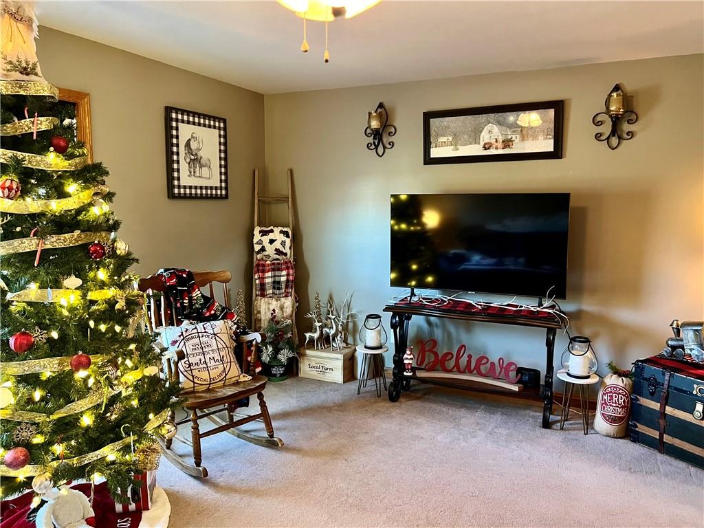 100 Perrine Road Grove City, PA 16127 - Photo 5 of 24 a living room with furniture and a flat screen tv