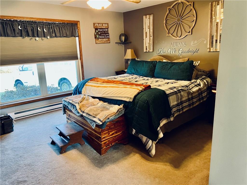 100 Perrine Road Grove City, PA 16127 - Photo 8 of 24 a bedroom with a bed and window