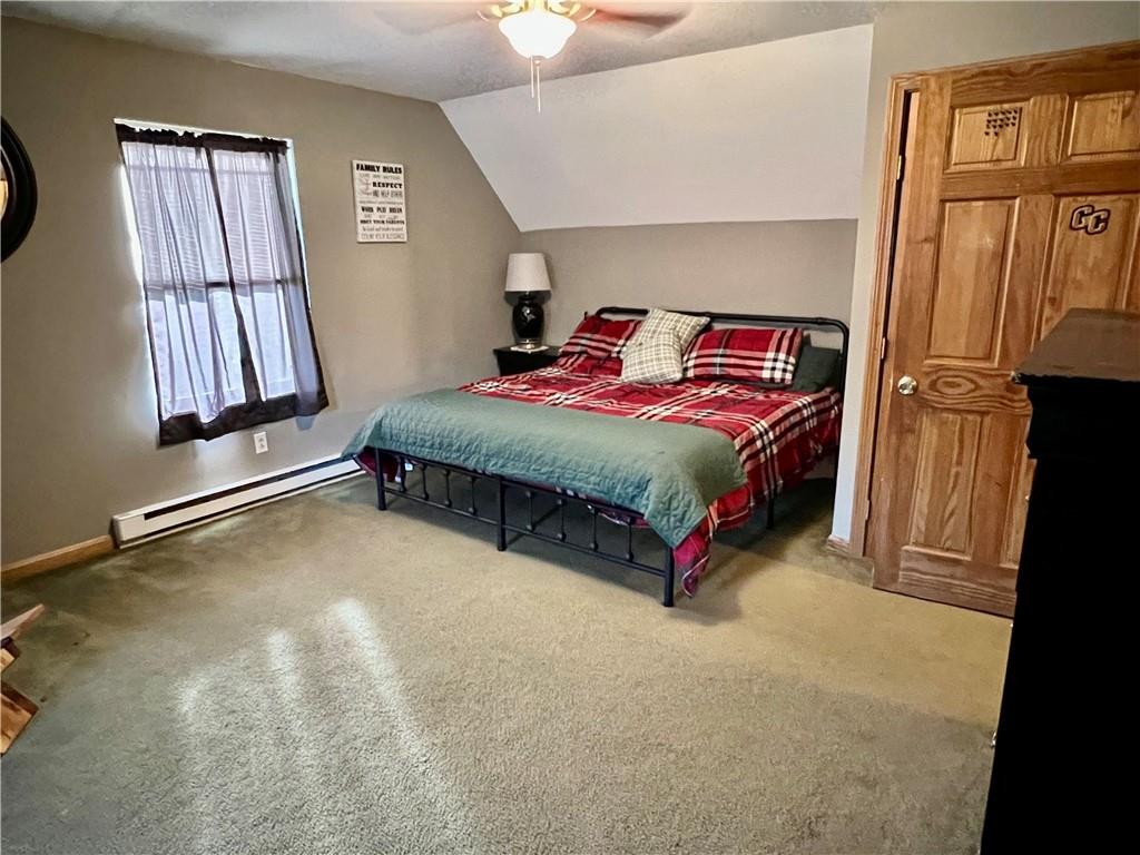 100 Perrine Road Grove City, PA 16127 - Photo 9 of 24 a bedroom with a bed and window