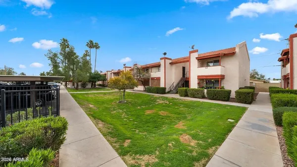 a kitchen with cabinets and a stove top oven