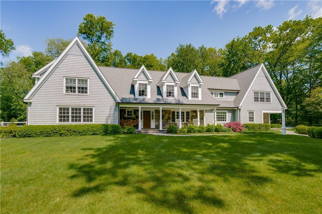 10 High Noon Road Weston, CT 06883 - Photo 1 of 1 a view of a house with a yard