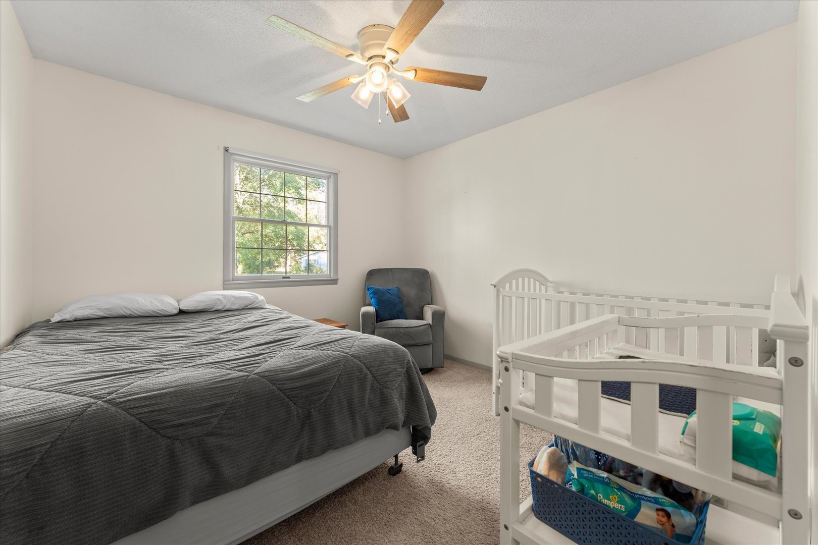 1108 Riverside Court Mahomet, IL 61853 - Photo 20 of 50 a bedroom with a bed next to a window