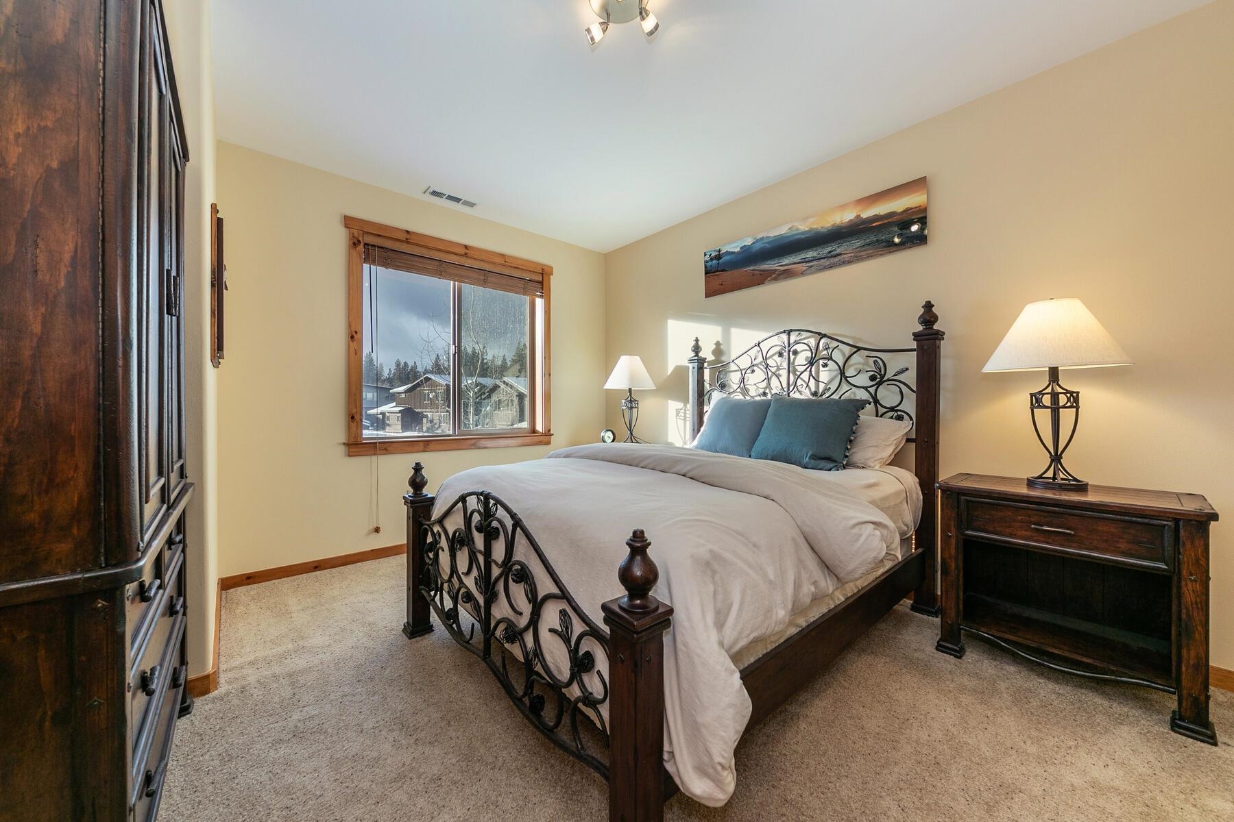 11592 Dolomite Way, Unit 4 Truckee, CA 96161 - Photo 11 of 21 a bedroom with a bed and a window