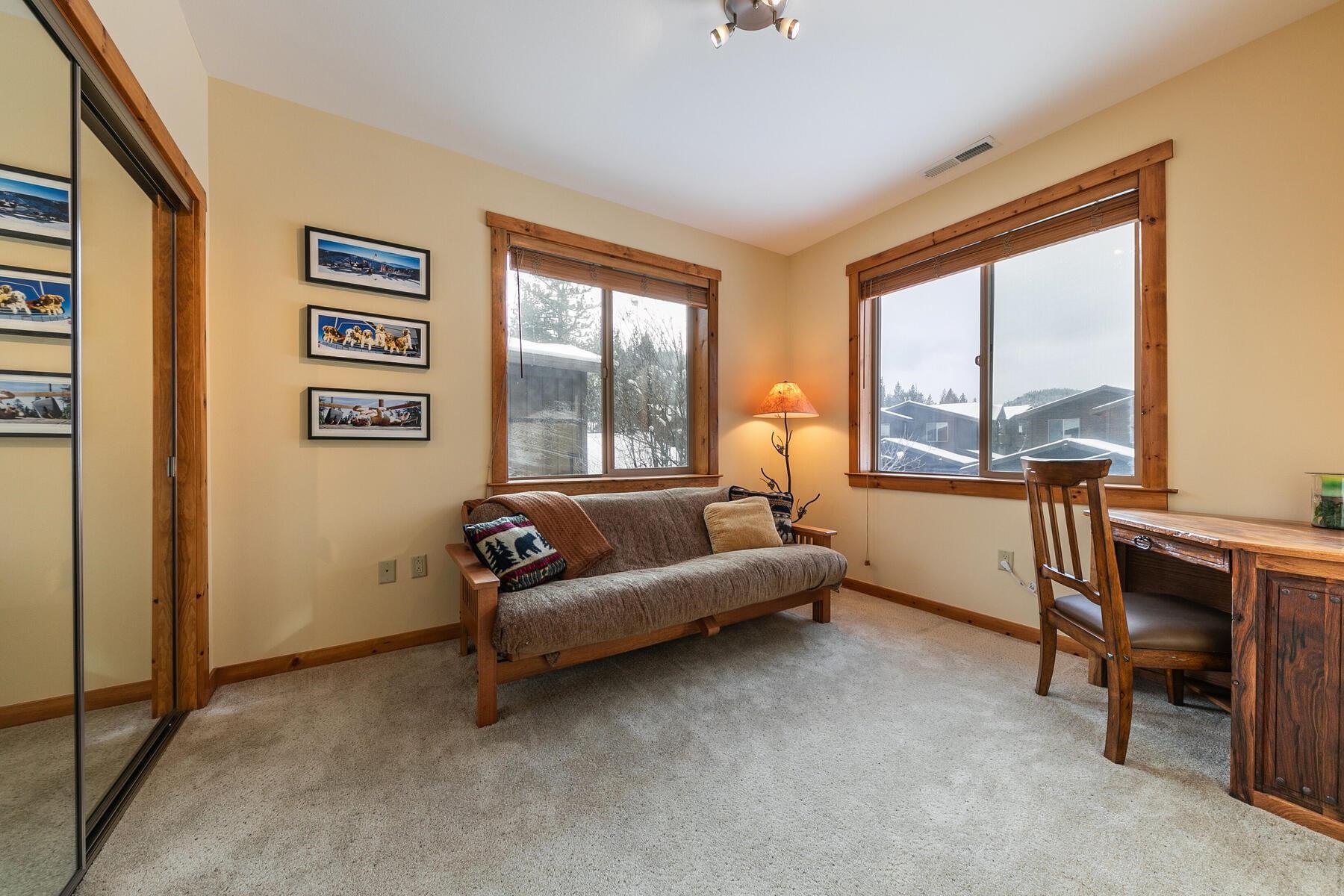 11592 Dolomite Way, Unit 4 Truckee, CA 96161 - Photo 16 of 21 a living room with furniture and a floor to ceiling window