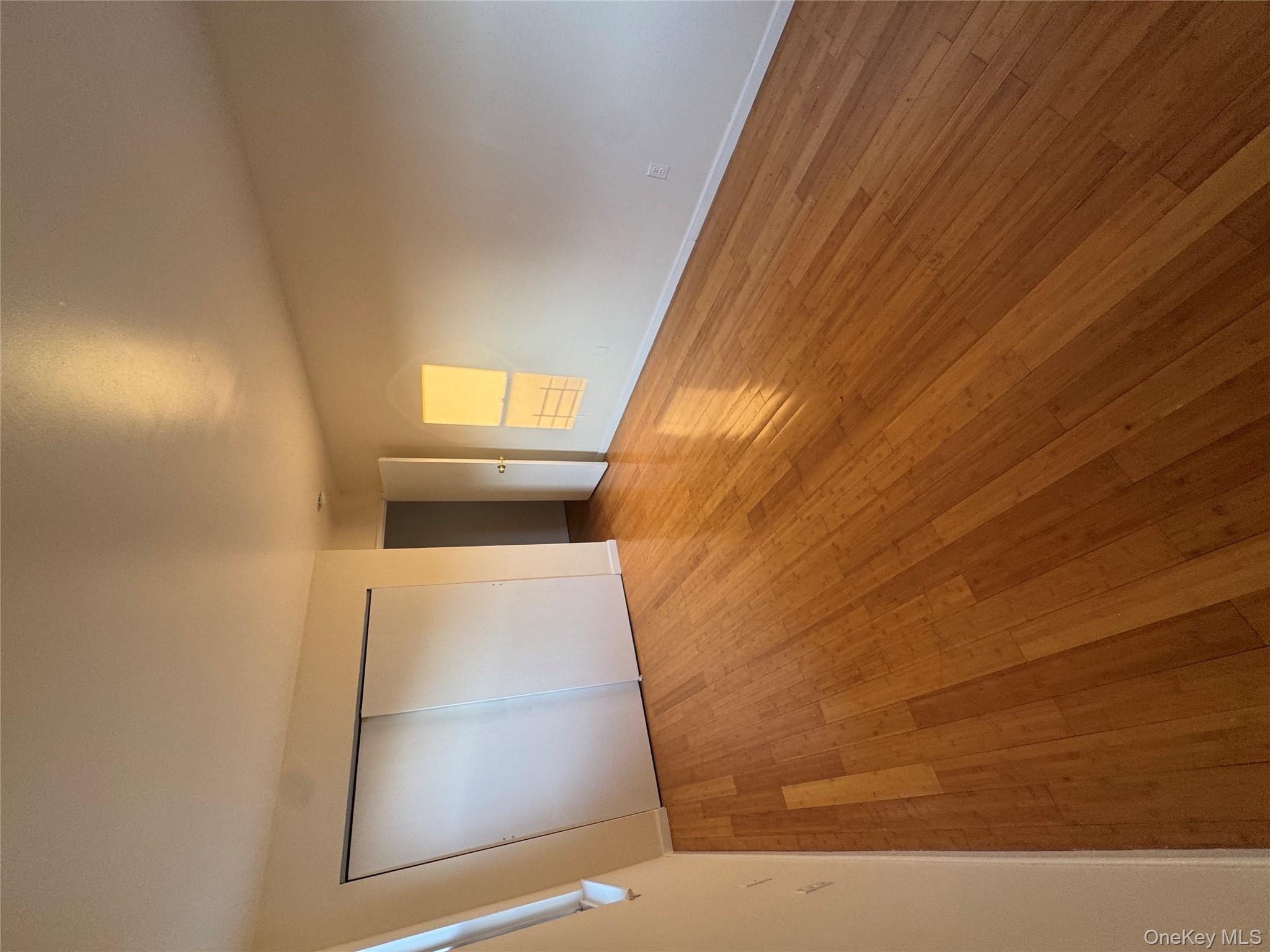 199 Hoover Road, Unit 2F Yonkers, NY 10710 - Photo 6 of 16 Unfurnished bedroom with a closet and light wood-type flooring