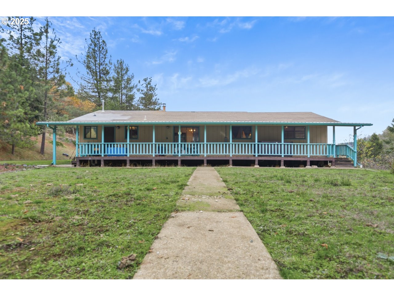 2100 Boyer Road Riddle, OR 97469 - Photo 21 of 33 a view of a house next to a big yard and large trees
