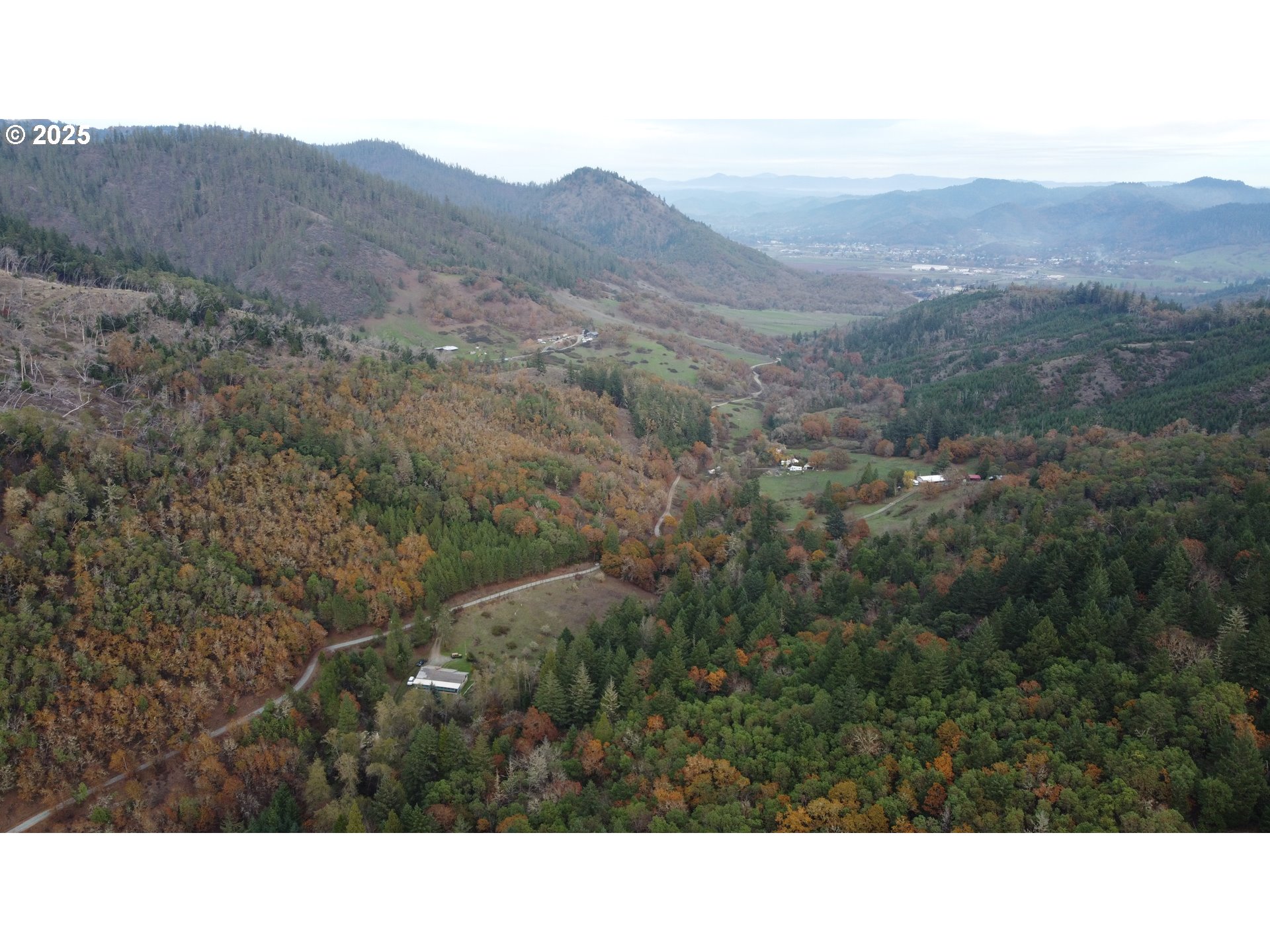 2100 Boyer Road Riddle, OR 97469 - Photo 25 of 33 a view of a mountain in the distance