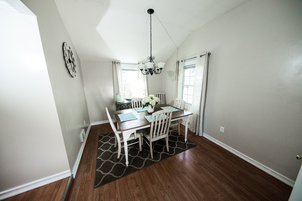 103 North Road Chelmsford, MA 01824 - Photo 18 of 29 a view of a dining room with furniture window and wooden floor