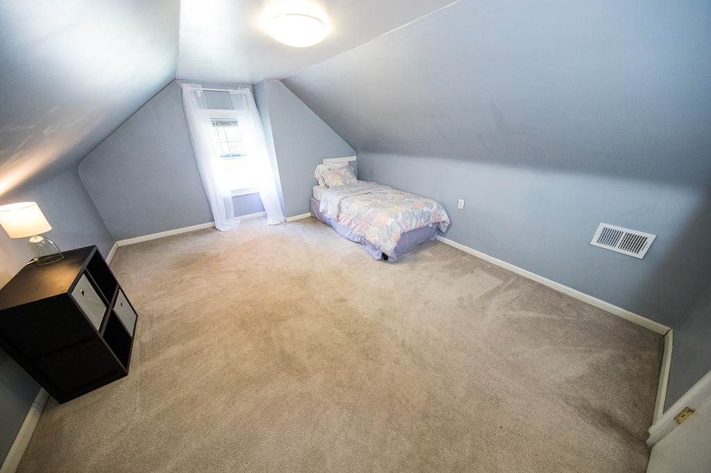 103 North Road Chelmsford, MA 01824 - Photo 23 of 29 a large room with a bed
