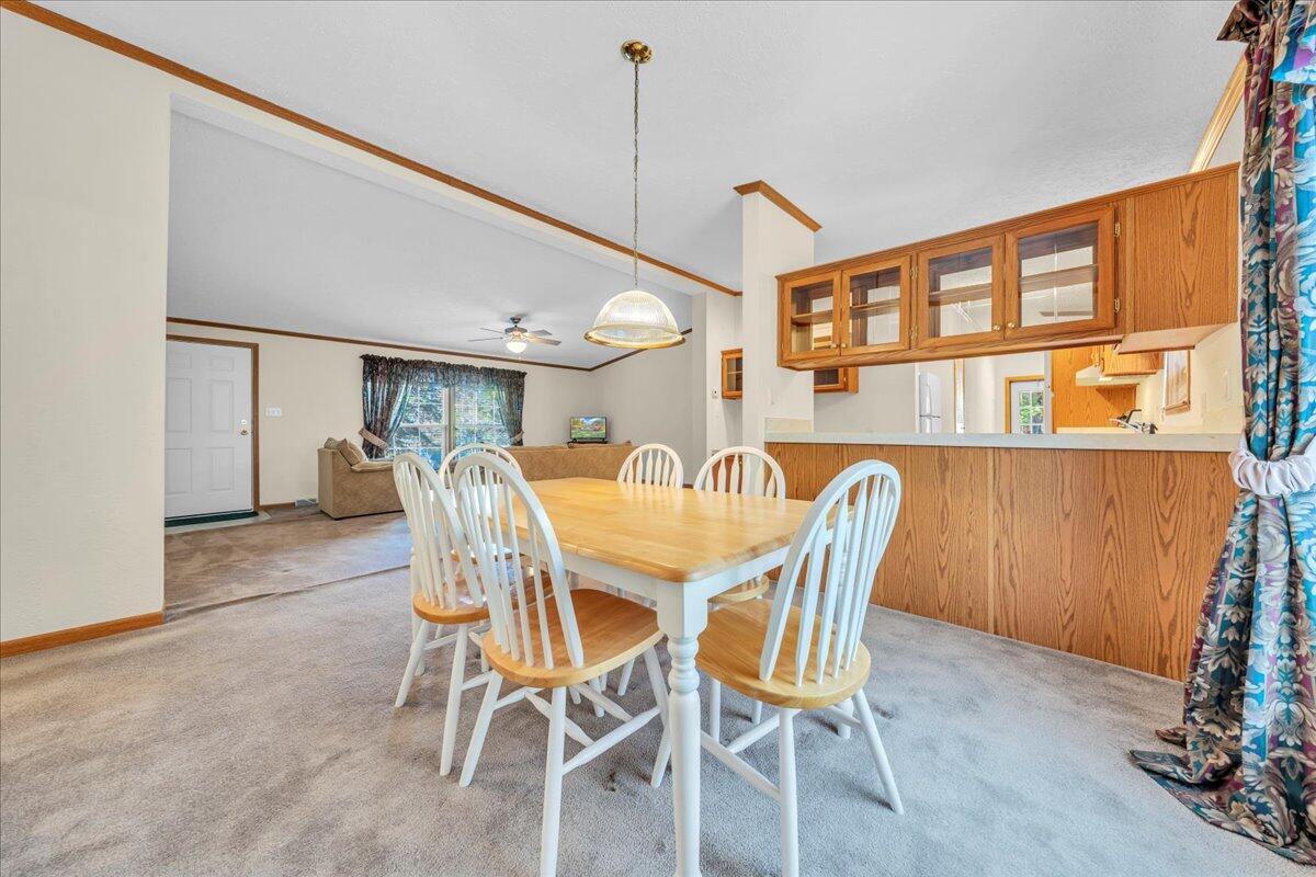 240 Highland Lake Road Union Hall, VA 24176 - Photo 9 of 56 a dining room with furniture and window