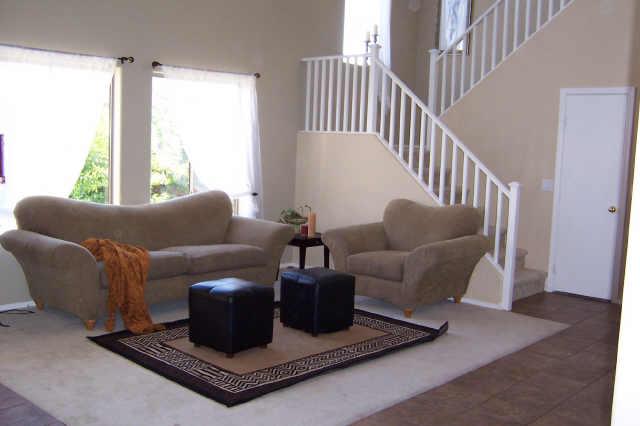 2405 West Carson Road Phoenix, AZ 85041 - Photo 5 of 5 a living room with furniture and a window