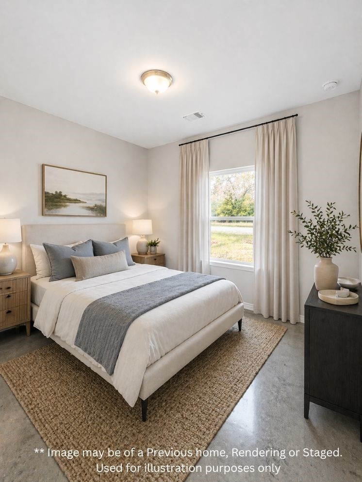 6 Greenway Drive Trinity, TX 75862 - Photo 20 of 27 a bedroom with a large bed and a potted plant