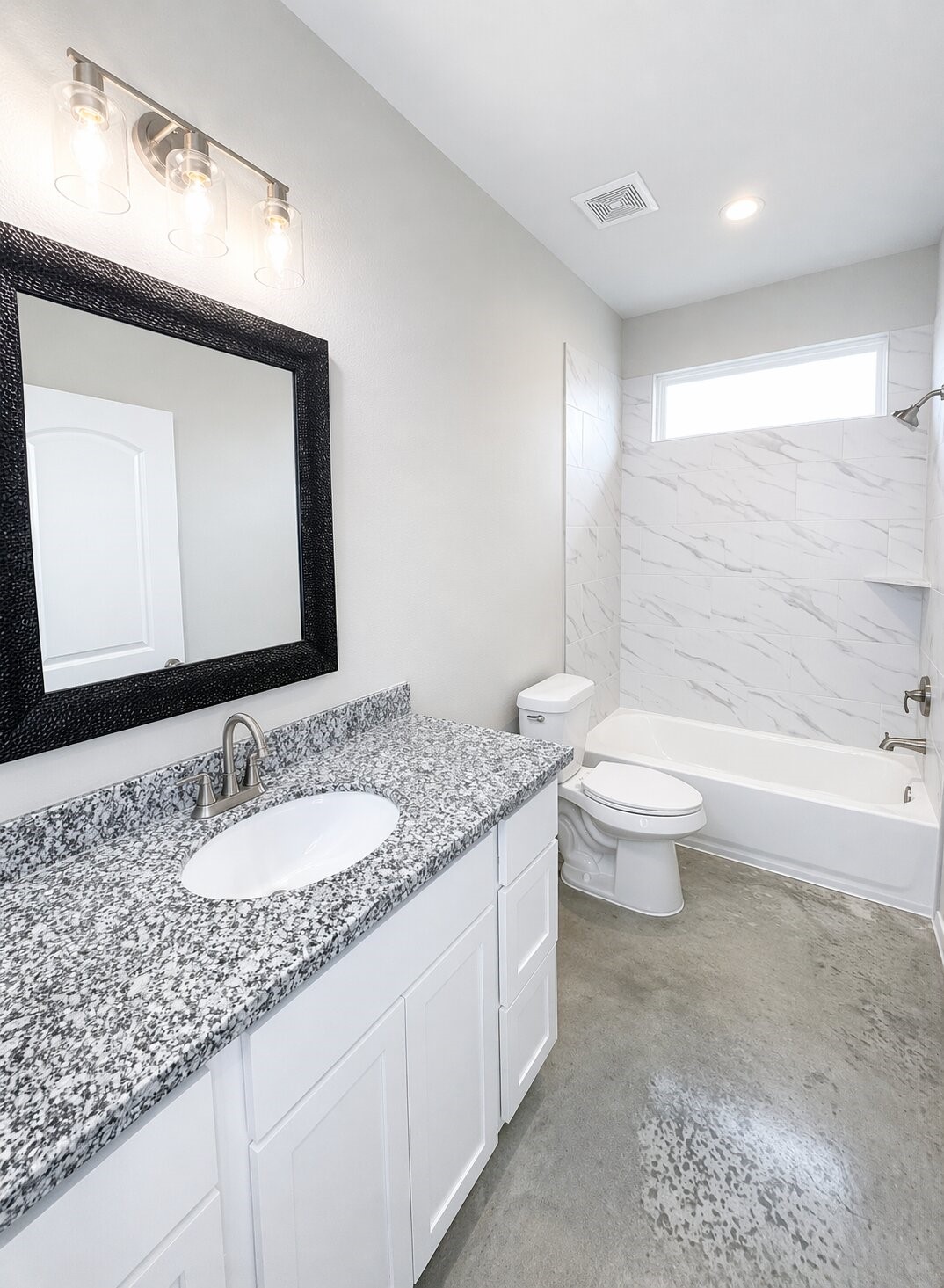 6 Greenway Drive Trinity, TX 75862 - Photo 21 of 27 a bathroom with a granite countertop sink and a mirror