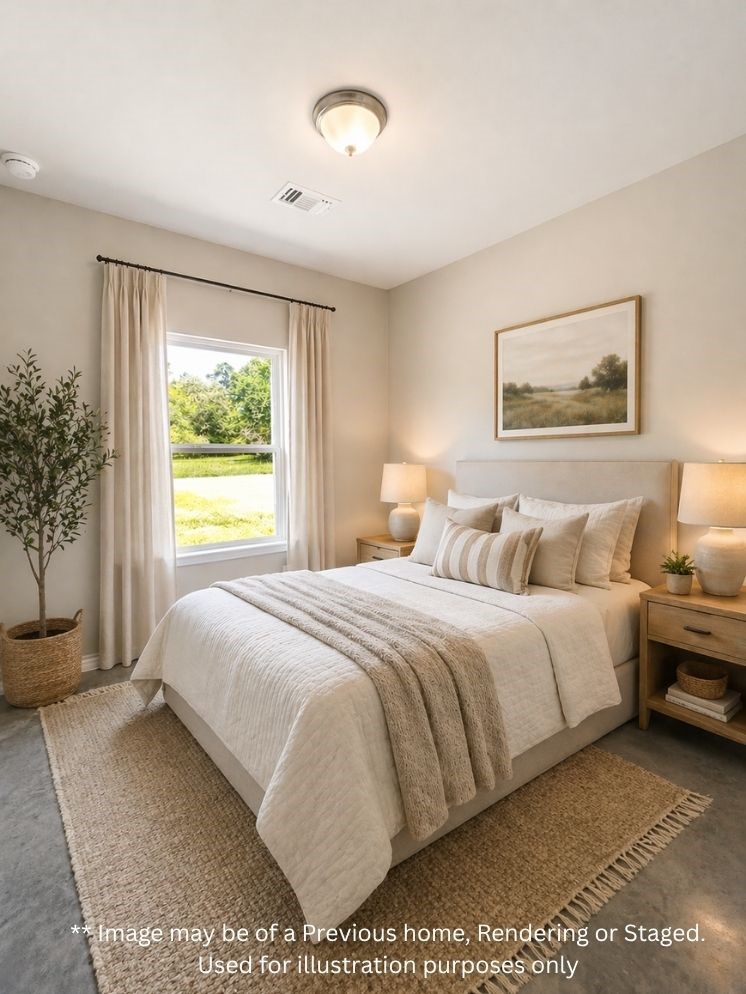 6 Greenway Drive Trinity, TX 75862 - Photo 24 of 27 a bedroom with a bed and a potted plant
