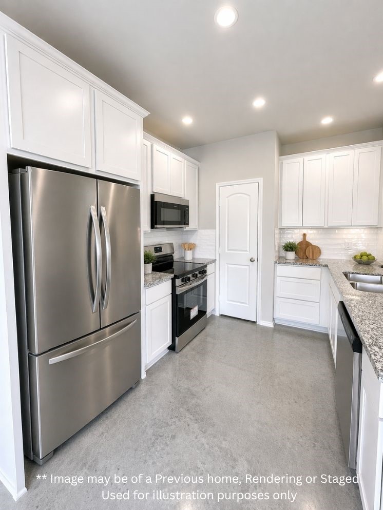 6 Greenway Drive Trinity, TX 75862 - Photo 10 of 27 a kitchen with stainless steel appliances a refrigerator sink and microwave