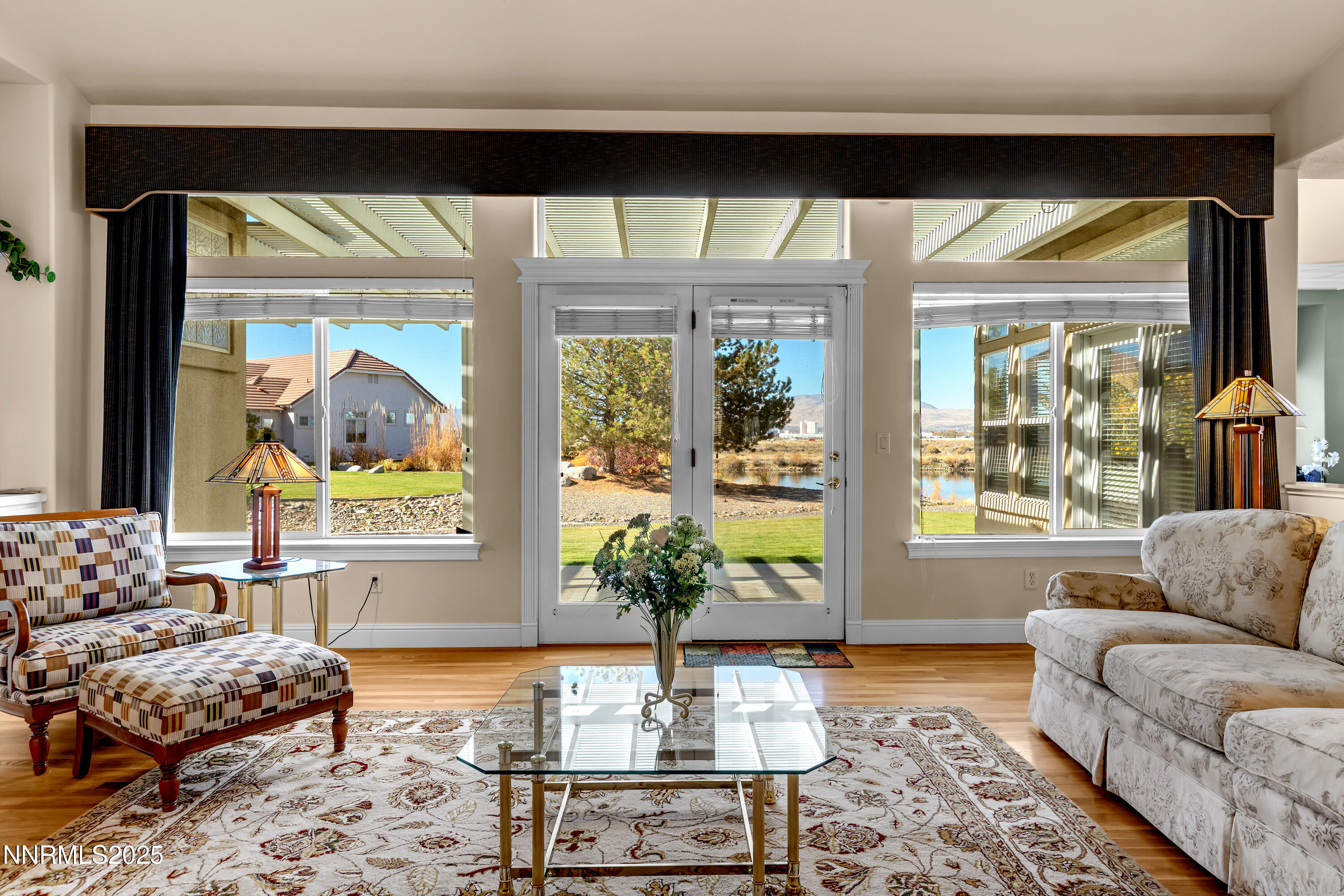 1860 Hidden Meadows Drive Reno, NV 89502 - Photo 23 of 34 a living room with furniture and a large window