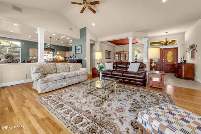 a living room with furniture and a rug