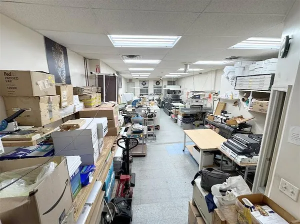 a bathroom with a sink a mirror and a shower
