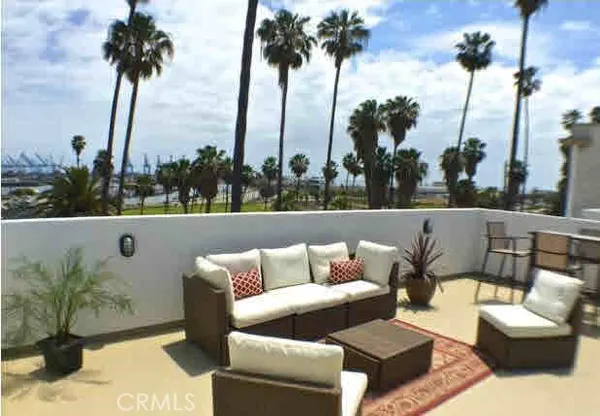 a roof of a house with outdoor seating