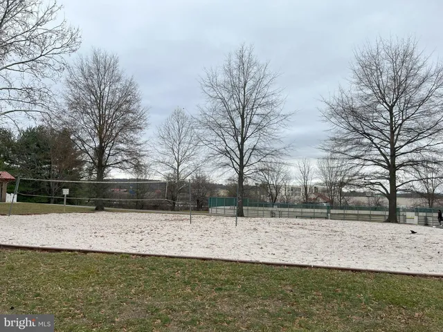 a view of yard covered with snow