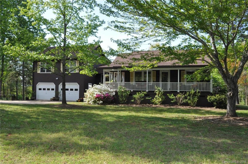 260 W Road Campobello, SC 29322 - Photo 1 of 23 a front view of a house with a yard