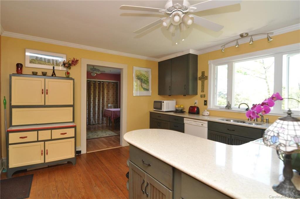 260 W Road Campobello, SC 29322 - Photo 16 of 23 a kitchen with a sink appliances and cabinets