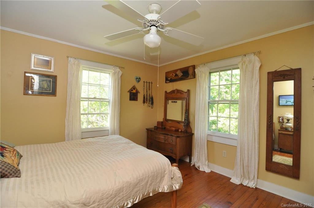 260 W Road Campobello, SC 29322 - Photo 18 of 23 a bedroom with a bed and a window