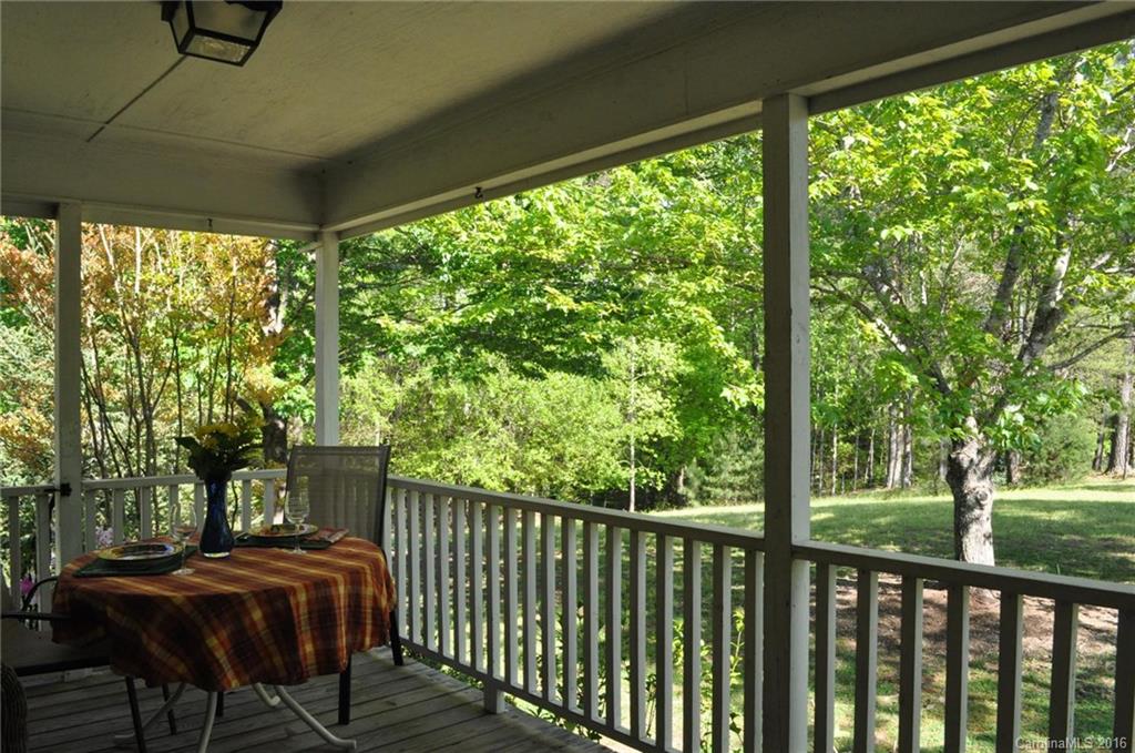 260 W Road Campobello, SC 29322 - Photo 6 of 23 a view of backyard with deck and outdoor seating