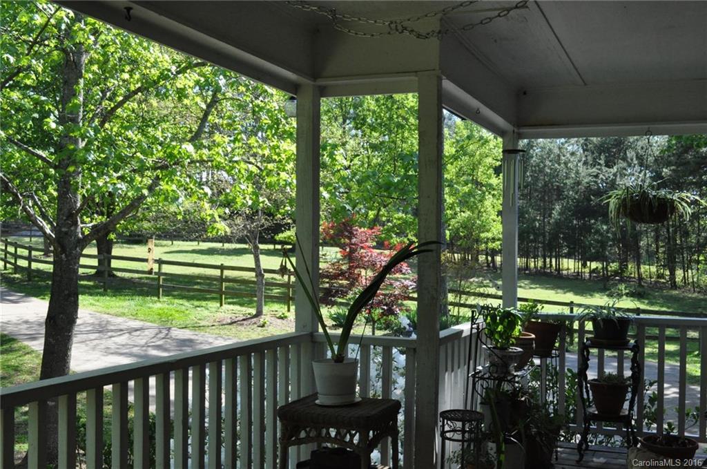 260 W Road Campobello, SC 29322 - Photo 7 of 23 a view of backyard with green space and seating