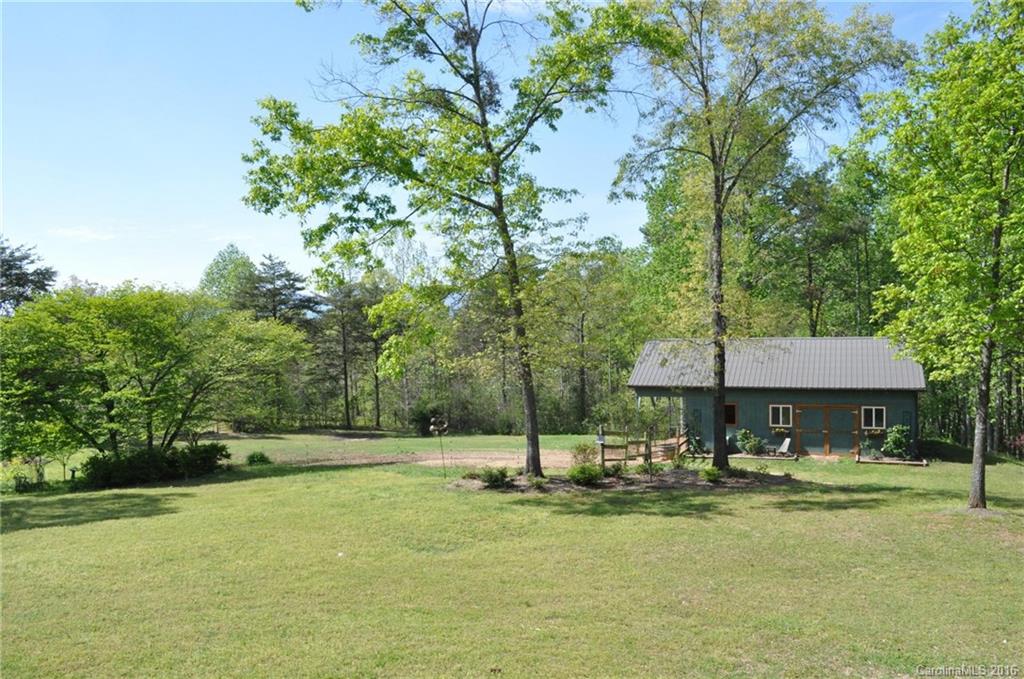 260 W Road Campobello, SC 29322 - Photo 8 of 23 a swimming pool view with a seating space