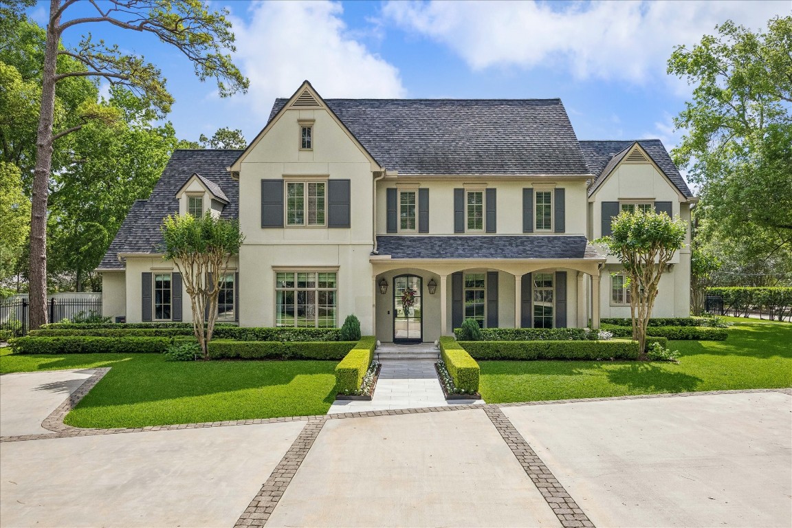 Showstopper in Hunters Creek on an incredible 31,317 SF lot. Notice the double wide driveway and parking pad.