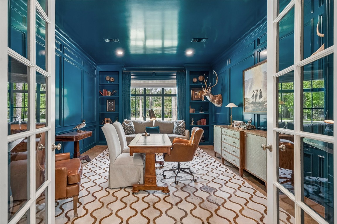 620 Hedwig Road Hunters Creek Village, TX 77024 - Photo 17 of 47 A richly appointed study enveloped in high-gloss paneled walls, with tailored built-ins and a bold, collected aesthetic