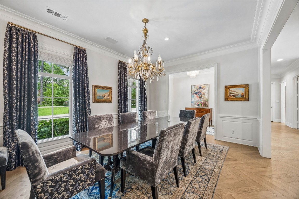 620 Hedwig Road Hunters Creek Village, TX 77024 - Photo 6 of 47 Dining room has white oak flooring in a herringbone pattern, plaster walls and ceiling and gracious millwork.