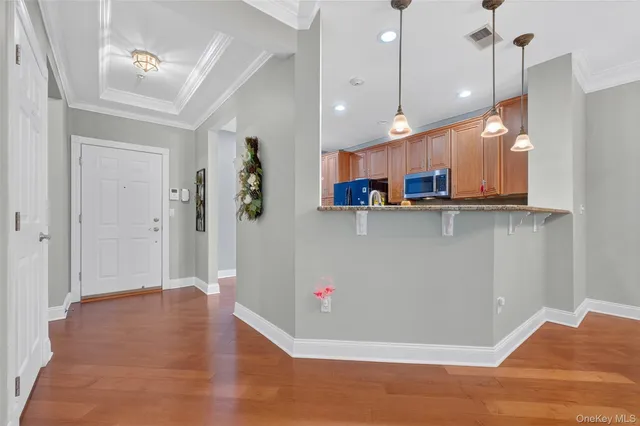 a view of a kitchen and window