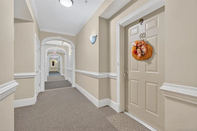 a view of a hallway with entryway