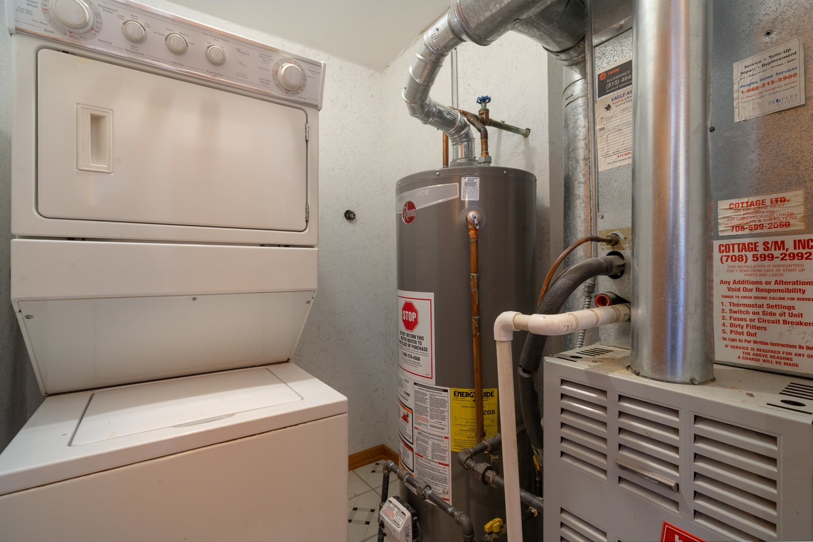 5242 West 79th Street, Unit 3D Burbank, IL 60459 - Photo 19 of 26 a utility room with dryer and washer