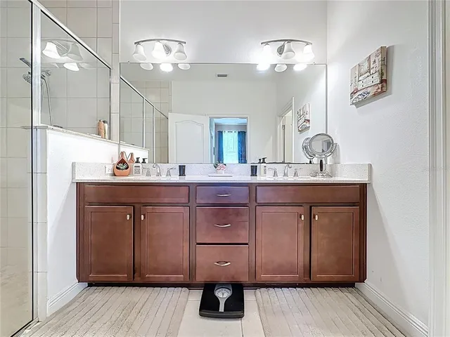 a view of a bedroom with closet and cabinet