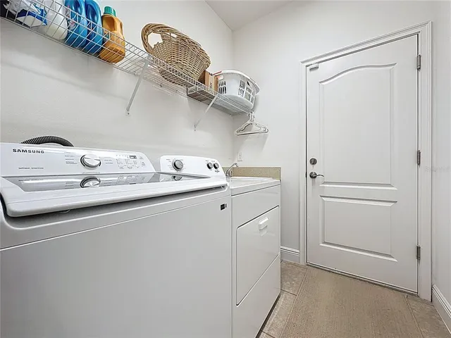 an aerial view of a city with lots of residential buildings
