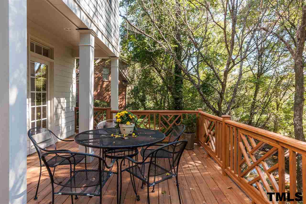 3201 Millstream Place Raleigh, NC 27609 - Photo 15 of 16 a view of balcony with furniture and wooden deck