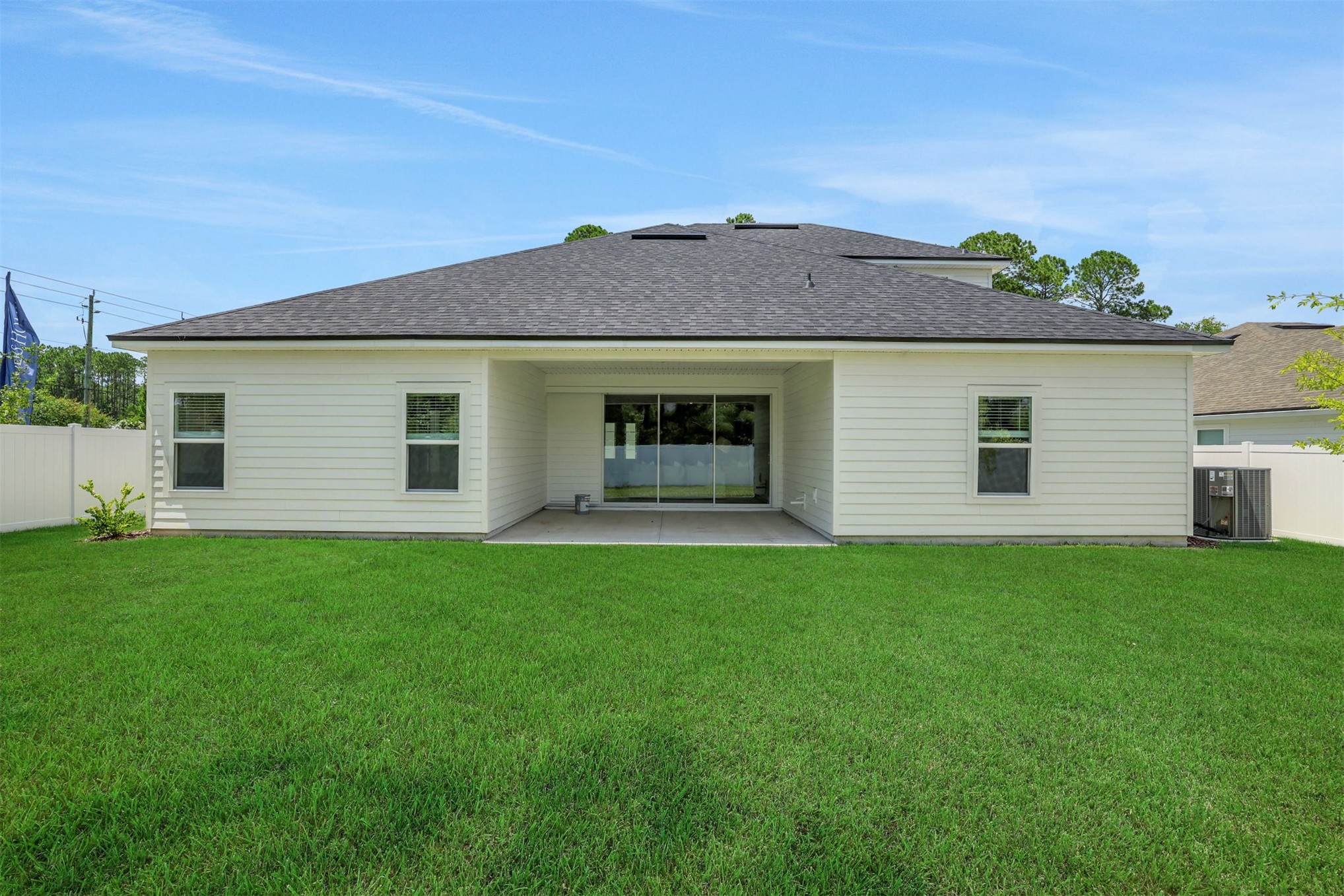 96040 Pirates Bluff Road Yulee, FL 32097 - Photo 35 of 38 a front view of a house with a garden
