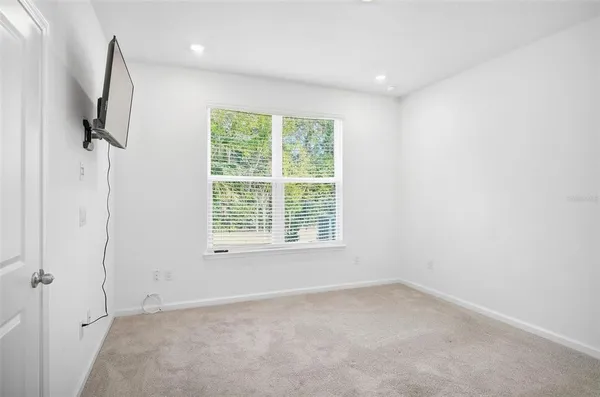an empty room with windows