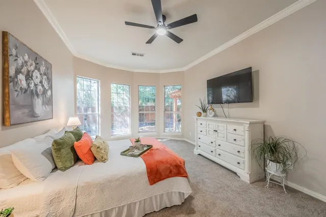 a bathroom with a double vanity sink mirror and bathtub